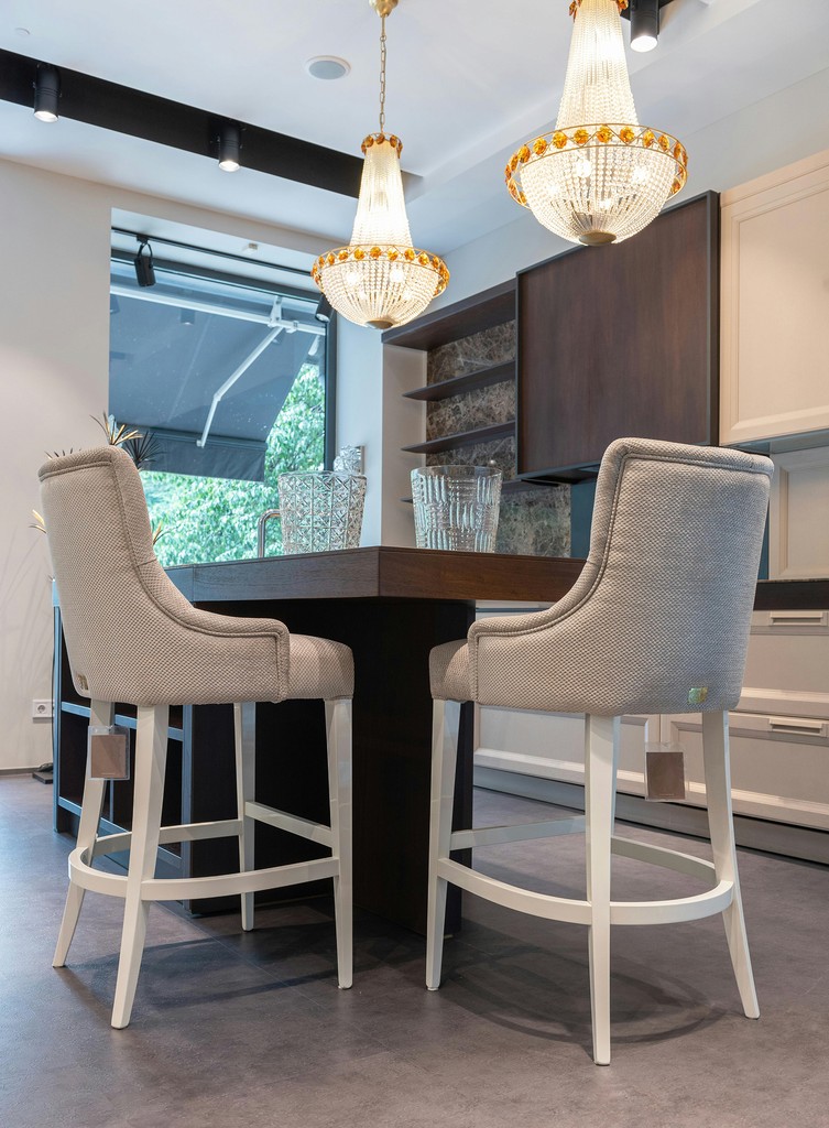 Modern kitchen island with bar chairs